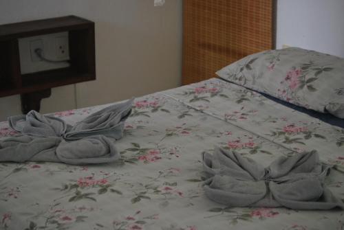 Een bed of bedden in een kamer bij MangoBrazil