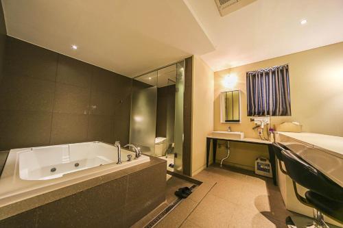 Ett badrum på Hotel Myeongjak