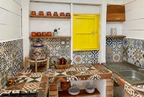Η κουζίνα ή μικρή κουζίνα στο Pintoresca casa en la playa
