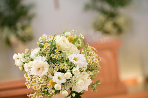 a bouquet of white roses and other flowers at Shin Yokohama Grace Hotel in Yokohama