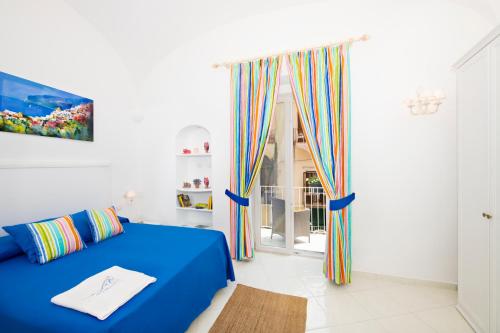 Postel nebo postele na pokoji v ubytování Casa Lucienne