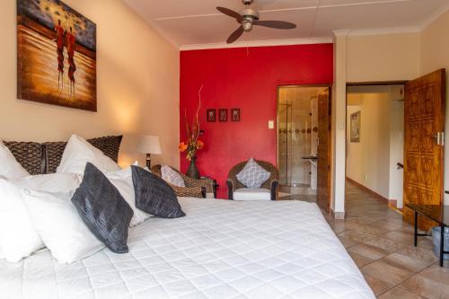Ένα ή περισσότερα κρεβάτια σε δωμάτιο στο Elephant Coast Guesthouse