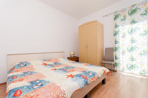 Postel nebo postele na pokoji v ubytování Apartments Ratko