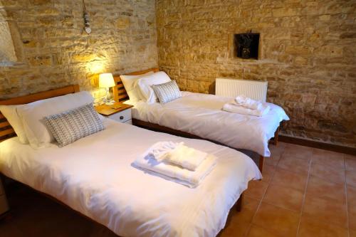 Posteľ alebo postele v izbe v ubytovaní Les Portes Vertes
