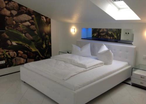เตียงในห้องที่ BEST LONGSTAY INN, homestead and extended stay - KRAL Hotels Erlangen