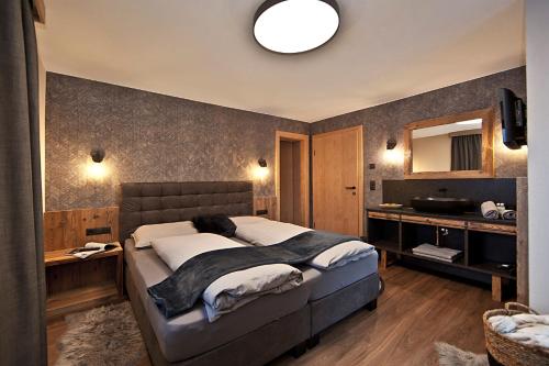 Ein Bett oder Betten in einem Zimmer der Unterkunft Villa Michaela