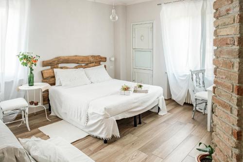 Tempat tidur dalam kamar di Villa Curte Nicia
