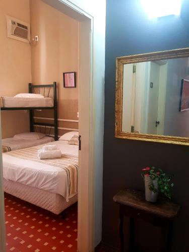 Ένα ή περισσότερα κρεβάτια σε δωμάτιο στο Flat Casa Grande