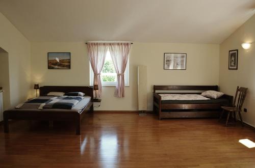 Posteľ alebo postele v izbe v ubytovaní Villa Gardena with private pool