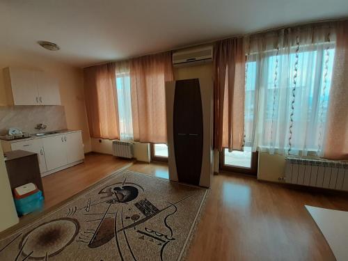 A kitchen or kitchenette at Gelov Hotel