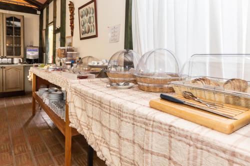
a table topped with plates of food at Quinta do Caracol in Tavira
