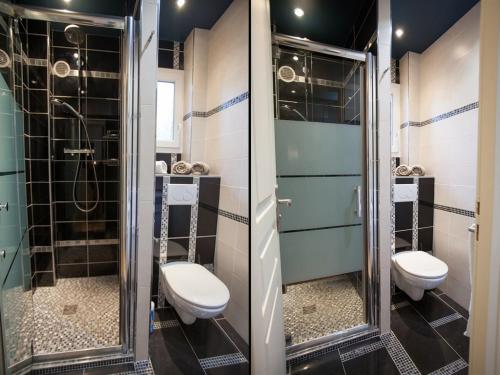 a bathroom with two toilets and a shower at Be You Luxury Apart'Hôtel 16 in Paris