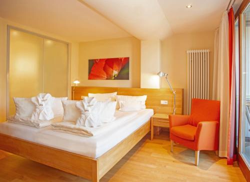 Postel nebo postele na pokoji v ubytování Bio Thermalhotel Falkenhof