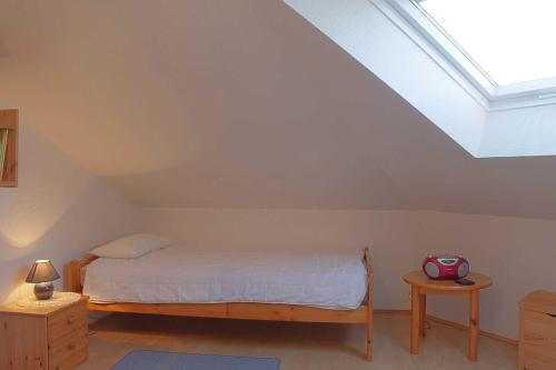 Una cama o camas en una habitación de Achteckhaus LT33a Max
