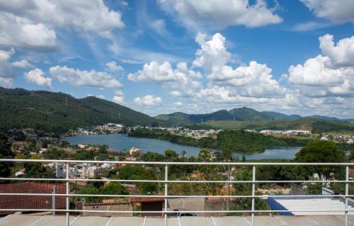 a view of a river from a balcony at Amsterdam lofts 2 in Poços de Caldas