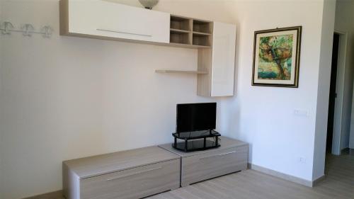 Televízia a/alebo spoločenská miestnosť v ubytovaní La Corte di Marino