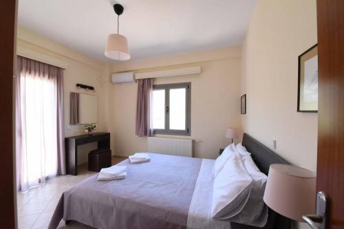 Ένα ή περισσότερα κρεβάτια σε δωμάτιο στο Seaside Villa AndroNikos (Evia Island)