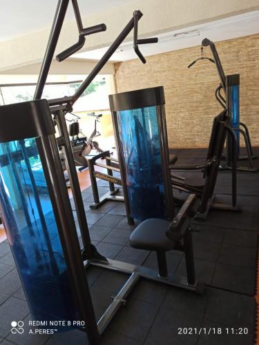 a gym with several exercise bikes in a room at Rio Búzios Beach Hotel in Búzios