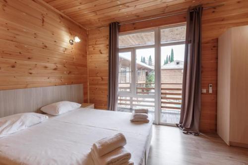 Postel nebo postele na pokoji v ubytování Guest House Amshin