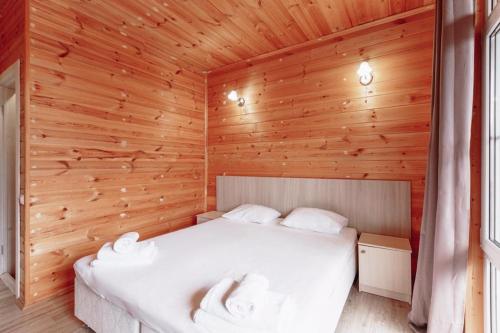 Postel nebo postele na pokoji v ubytování Guest House Amshin