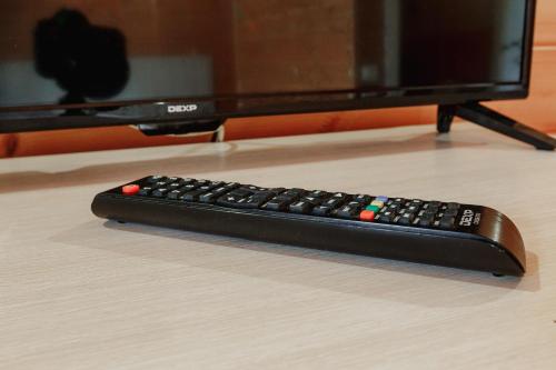 TV a/nebo společenská místnost v ubytování Guest House Amshin