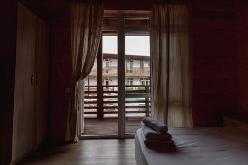 Postel nebo postele na pokoji v ubytování Guest House Amshin