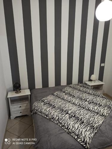Postel nebo postele na pokoji v ubytování Sicilia bedda