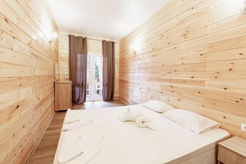 Postel nebo postele na pokoji v ubytování Guest House Amshin