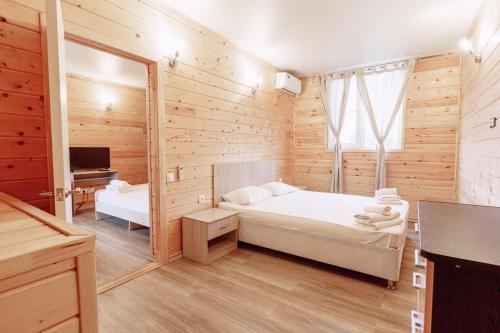 Postel nebo postele na pokoji v ubytování Guest House Amshin