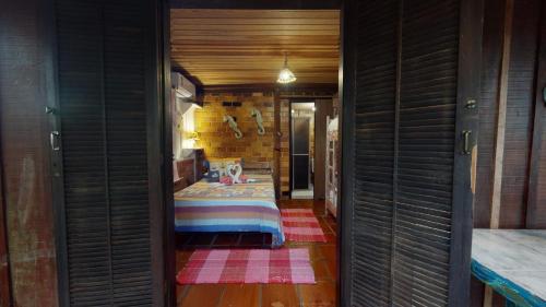 Ένα ή περισσότερα κρεβάτια σε δωμάτιο στο Hotel Pousada Praia do Farol