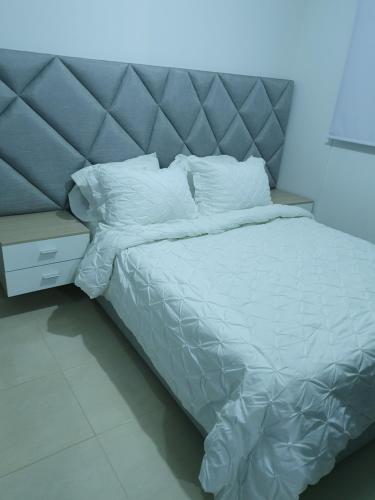 Säng eller sängar i ett rum på Apartamento Completo, Perfecto para tus viajes