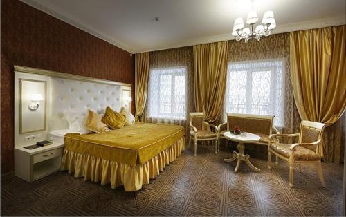 מיטה או מיטות בחדר ב-Premium Hotel Pushkin