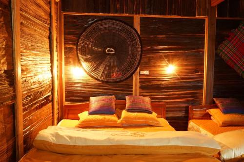 Tempat tidur dalam kamar di Hello Mu Cang Chai Homestay