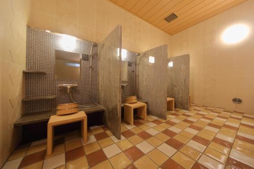 a bathroom with two sinks and a toilet at Onyado Nono Namba Natural Hot Spring in Osaka