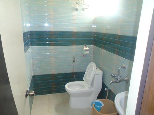 Ванная комната в SV Dreamstay near Kempegowda International Airport
