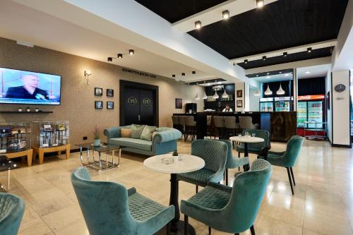 The lounge or bar area at Hotel Moravica