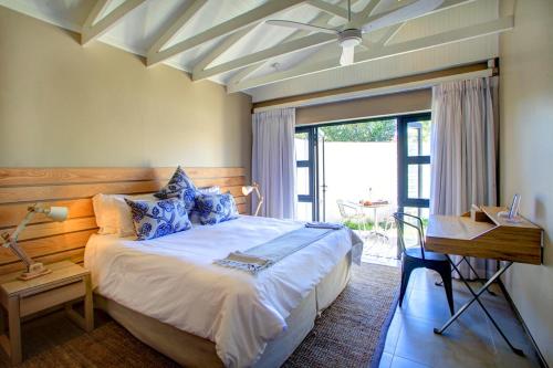 מיטה או מיטות בחדר ב-Scallop Lodge