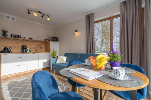 Kuchyňa alebo kuchynka v ubytovaní RentPlanet - Apartamenty Schroniskowa