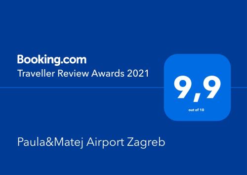 a blue box with the text travel review awards at Paula&Matej Airport Zagreb in Selnica Šćitarjevska