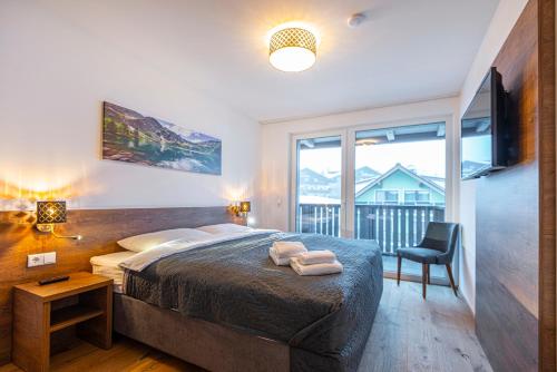 Posteľ alebo postele v izbe v ubytovaní Haus Bergblick by AlpenTravel