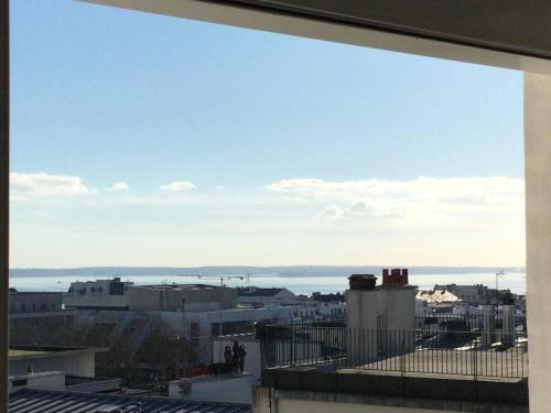 a view of the city from the roof of a building at Appartement vue mer Brest hyper centre in Brest