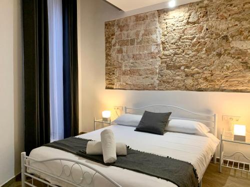 Postel nebo postele na pokoji v ubytování Vila Badalona
