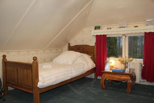Postel nebo postele na pokoji v ubytování B&B Luttelhof, de goedkoopste in de regio !