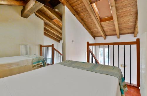 Ένα ή περισσότερα κρεβάτια σε δωμάτιο στο UR-NEST Beverara
