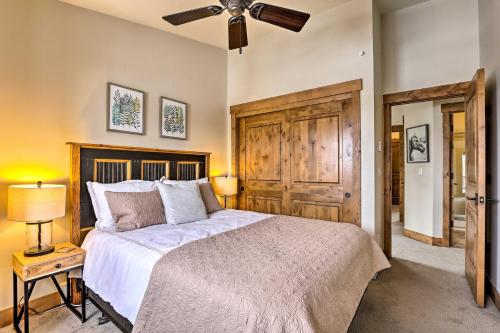a bedroom with a bed and a ceiling fan at Frisco Home with Mountain Views Walk to Main St! in Frisco