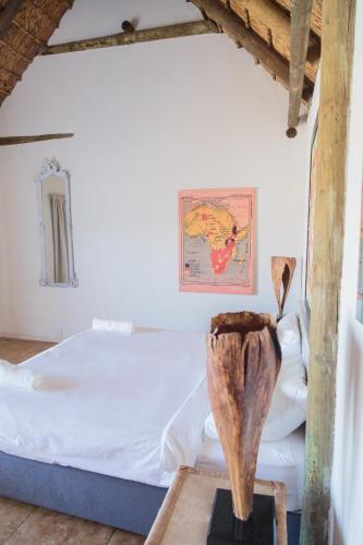Postel nebo postele na pokoji v ubytování Karoo 1 Hotel Village