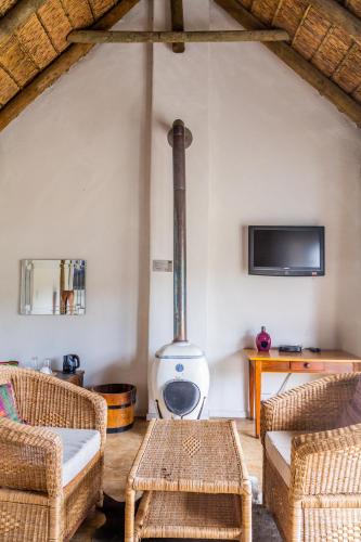 TV a/nebo společenská místnost v ubytování Karoo 1 Hotel Village
