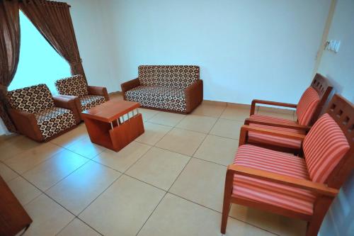 Zona de estar de Clay House
