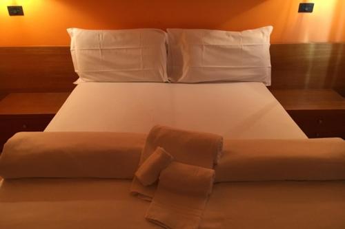 Lova arba lovos apgyvendinimo įstaigoje HOTEL CAVALIERI