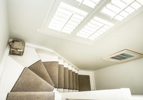 a skylight in a house with a staircase at Hideaway in North Berwick